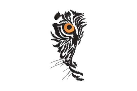 Abstract tiger eye embroidery design in amber and black with geometric satin wedges forming the iris and pupil on white background