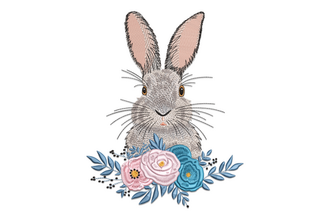 Floral bunny machine embroidery design showing white sitting rabbit surrounded by blush roses, lavender sprigs, cream daisies, and green leaves in a soft spring garden wreath arrangement.