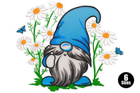Blue gnome embroidery design with tall cobalt hat, grey beard, round blue glasses, white daisy flowers with orange centres, small blue butterflies, dark green stems, 6 sizes 4-9 inch