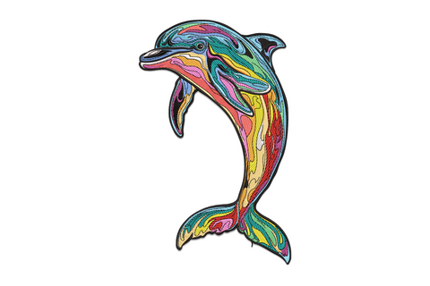 Colorful dolphin embroidery design showing a leaping dolphin body filled with flowing bands of teal, pink, orange, yellow, red and purple inside a black outline silhouette.