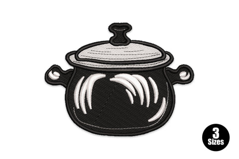 Cooking pot embroidery design, round black Dutch oven with grey lid, white highlight swirls and two ear handles.