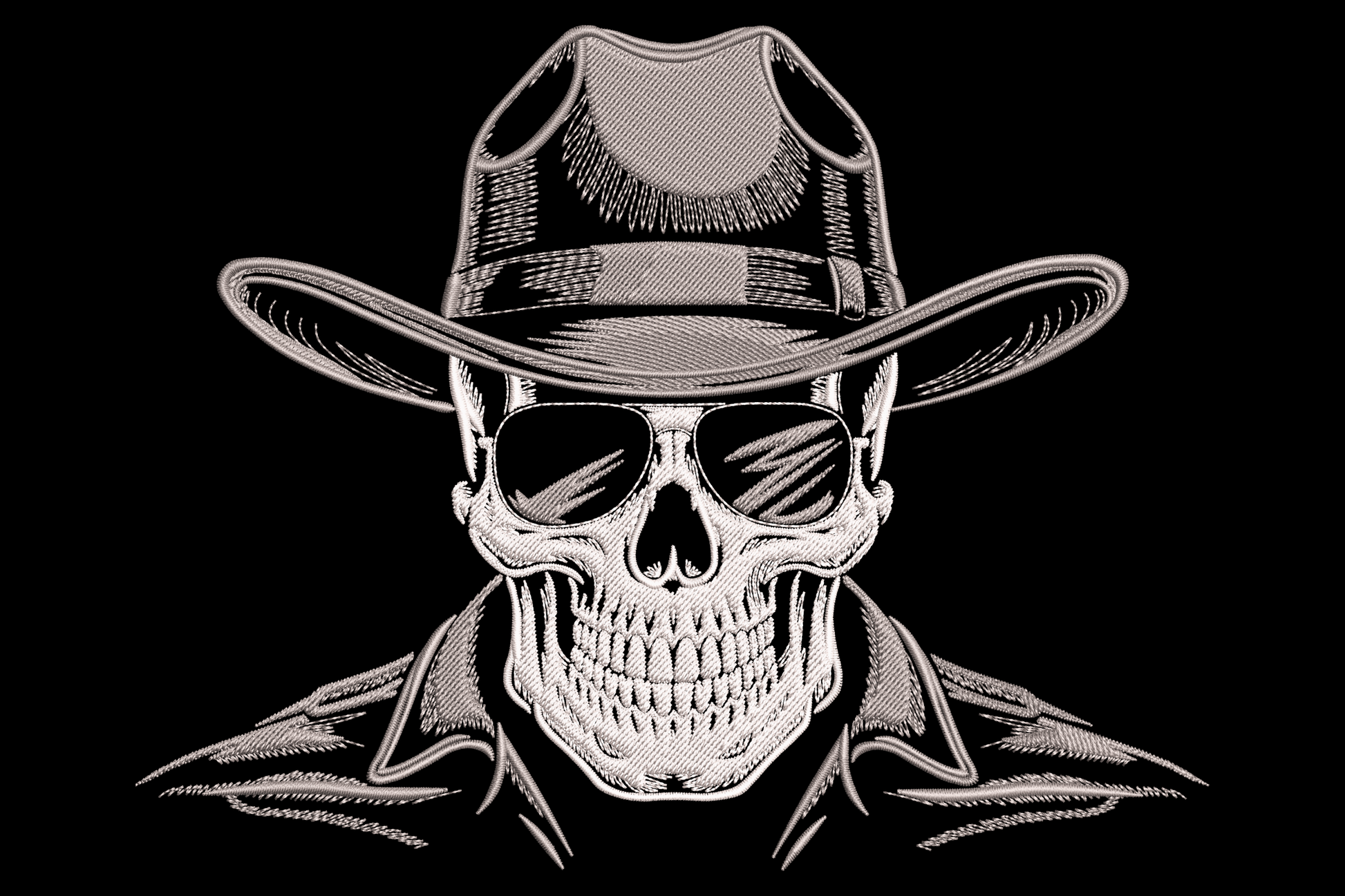 Cowboy skull with sunglasses embroidery, grey wide-brim hat and dark shades with tribal tendrils trailing from the jaw