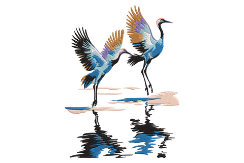 Dancing crane embroidery design with two red-crowned cranes mid-dance, blue and amber wings, water reflections in soft stitching.