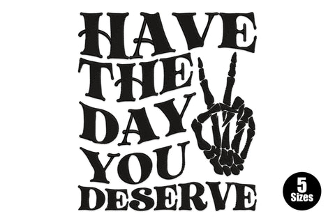 Have the day you deserve quote embroidery design in bold sans-serif block letters stacked across three lines, deep navy or black thread, compact rectangular composition.