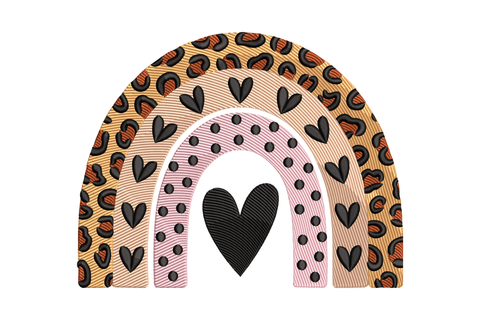 Two rainbow-shaped hair clips with heart designs on a white background