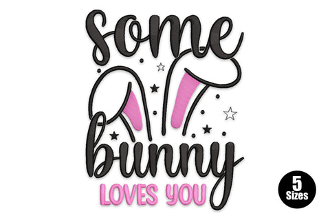 Some bunny loves you embroidery design with black brush-script lettering, pink bunny ears peeking through, and bold pink block letters at the base.